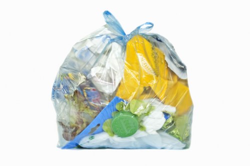 Charity workers loading donated furniture for reuse